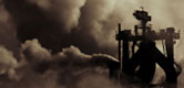Image: Chimneys emitting clouds of polution into the atmosphere
