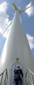 Image:  Engineer going into turbine
